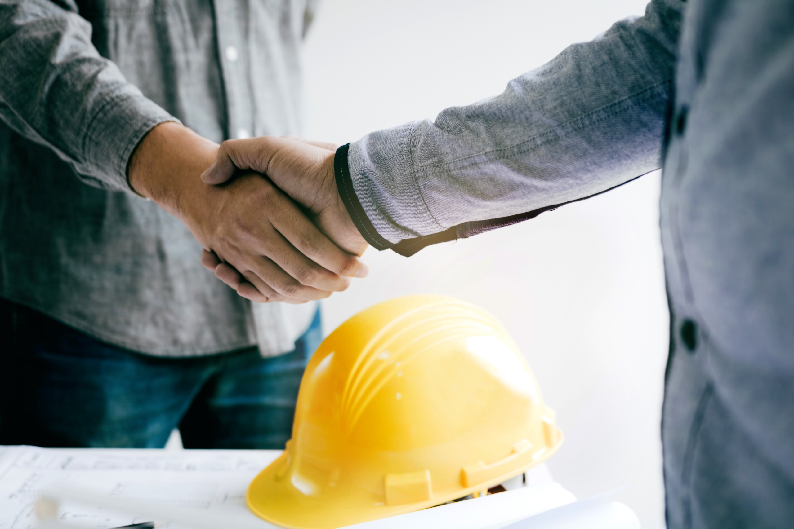 Construction Workers Handshake